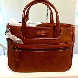 Shepax concealed carry purse.  Brand new, never used.